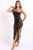 Black off-the-shoulder tube dress by Puce Juniper featuring asymmetric design and mesh contrast, shown on a model.