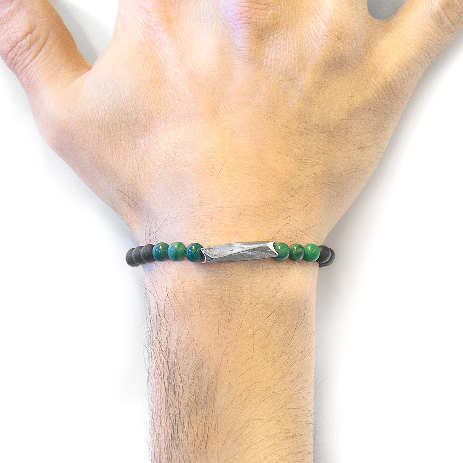 Green jade and silver stone bracelet by Magenta Sooty featuring a stylish design with green jade beads and silver accents.
