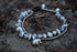 Silver stone bracelet featuring boho elephant charms from Tan Smokey, showcasing intricate design and natural gemstone details.