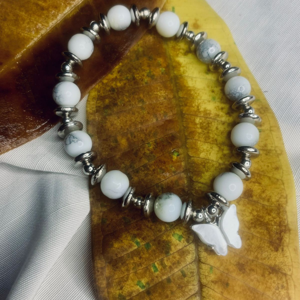 Jasper bead bracelet for women by Tan Saffron featuring silver spacer beads on a stretchy band.