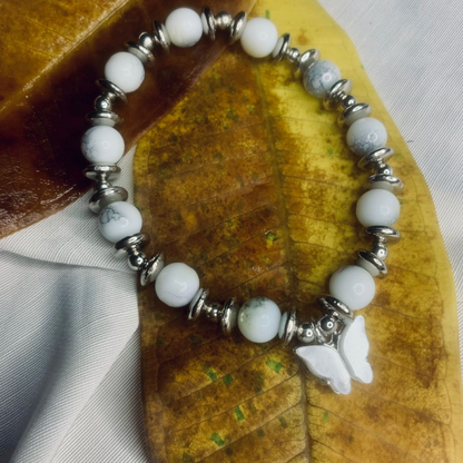 Jasper bead bracelet for women by Tan Saffron featuring silver spacer beads on a stretchy band.