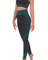 Lazurite Trois Seamless Activewear leggings in black with blue accents, shown laid flat revealing their stretchy, seamless design.