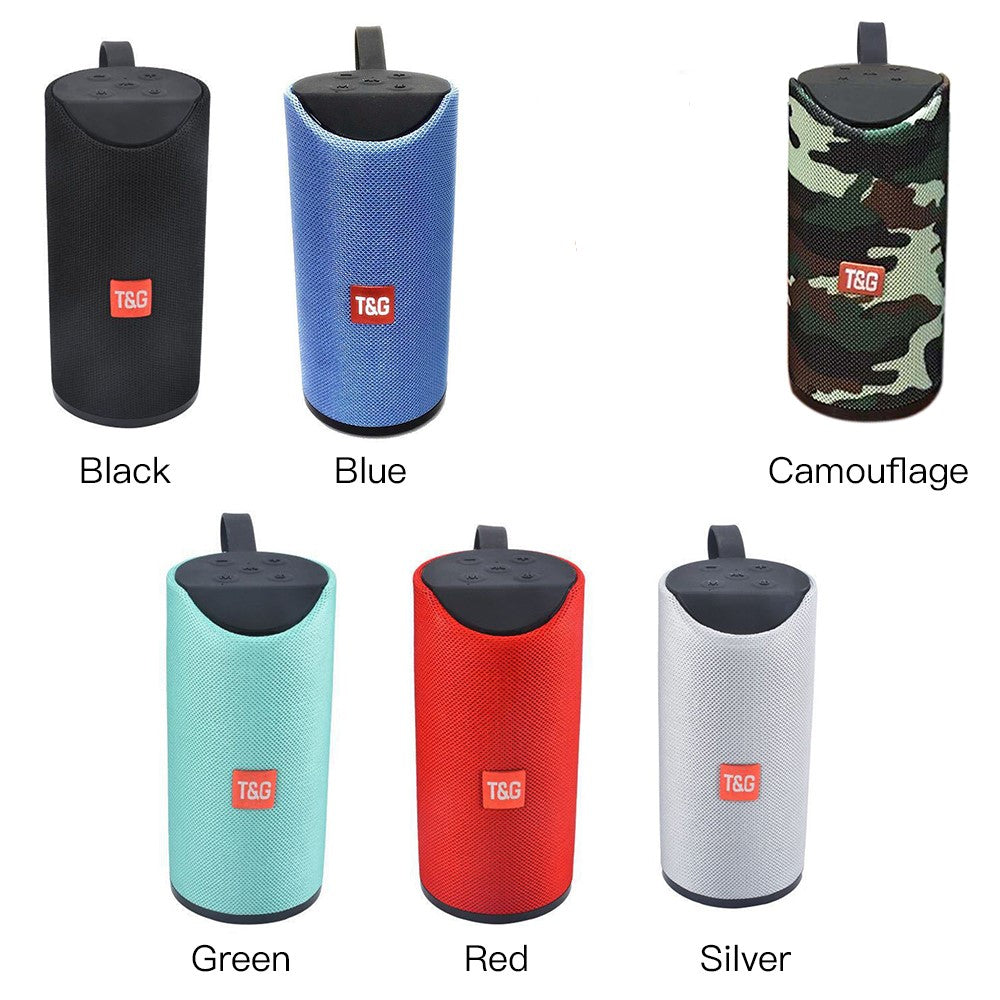 Lilac Milo TG portable outdoor Bluetooth stereo loudspeaker showing compact design and control buttons in an outdoor setting.