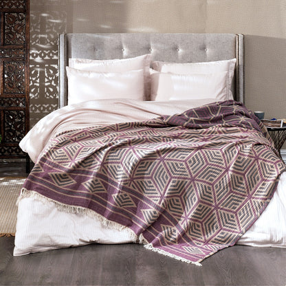 Ela Soft Jacquard Cotton Bedspread by Olive Rose, showcasing a detailed textured pattern on a neatly made bed.