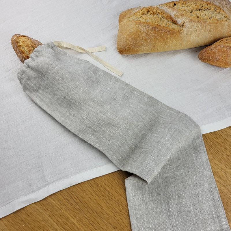 Biotite linen bread bag in natural color, kitchen storage accessory with breathable fabric for fresh bread storage.