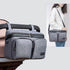 Maroon Chronos stroller organizer caddy bag with multiple compartments, attaching to a stroller for convenient parent and accessory storage.