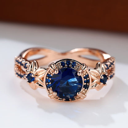 Carmine Medusa sapphire ring featuring a polished silver band with a central blue sapphire gemstone.