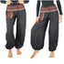 Tan Smokey cotton women’s tribal boho pants with a relaxed fit and colorful ethnic patterns, perfect for a hippie-inspired look.