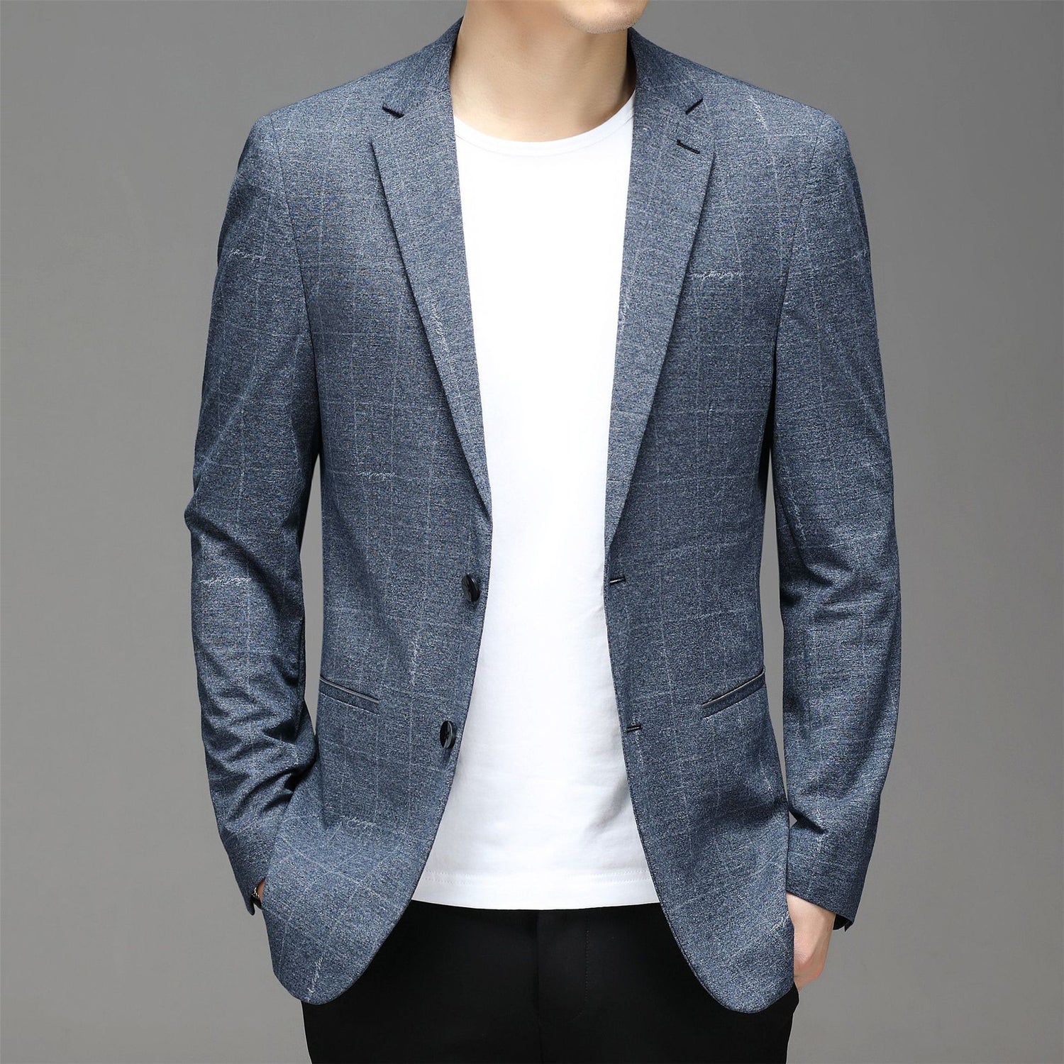Carmine Juneberry Metropolitan Slim-Fit Blazer from Haute Edition 25, tailored in a sleek, modern style with structured lapels and a dark fabric.