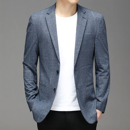 Carmine Juneberry Metropolitan Slim-Fit Blazer from Haute Edition 25, tailored in a sleek, modern style with structured lapels and a dark fabric.