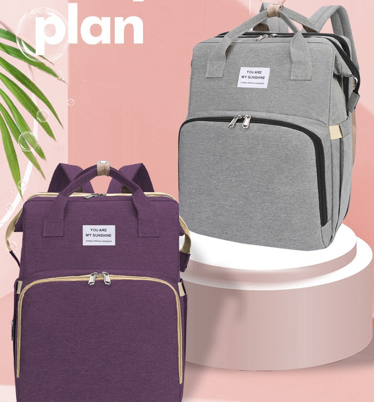 Carmine Juneberry ALLFASHION™ FoldAway BabyNest Backpack featuring adjustable straps, compact design, and baby carrier functionality.