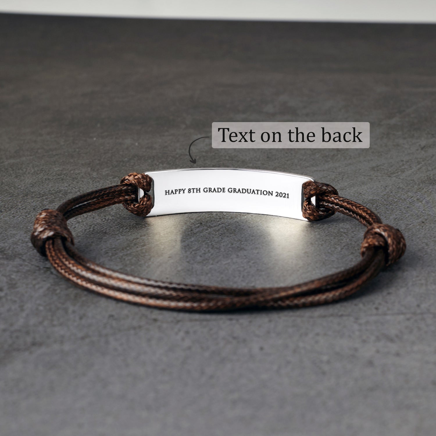 Green Millie personalized bracelet for son, featuring engraved message, ideal graduation gift from mom, casual and stylish jewelry.