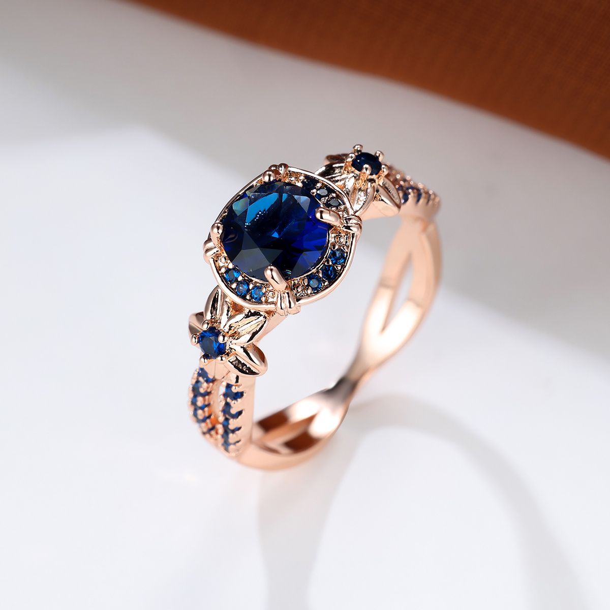 Carmine Medusa sapphire ring featuring a deep blue gemstone set in a silver band with intricate detailing.