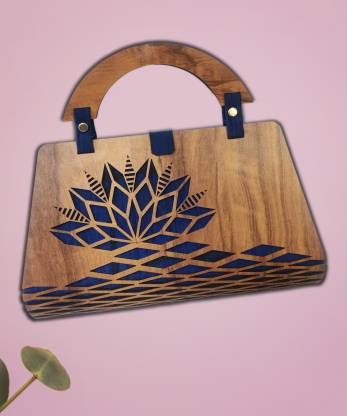 Decorative wooden ladies purse showpiece from Pear Smokey, featuring intricate craftsmanship and stylish design in a bags and wallets display.