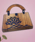 Decorative wooden ladies purse showpiece from Pear Smokey, featuring intricate craftsmanship and stylish design in a bags and wallets display.