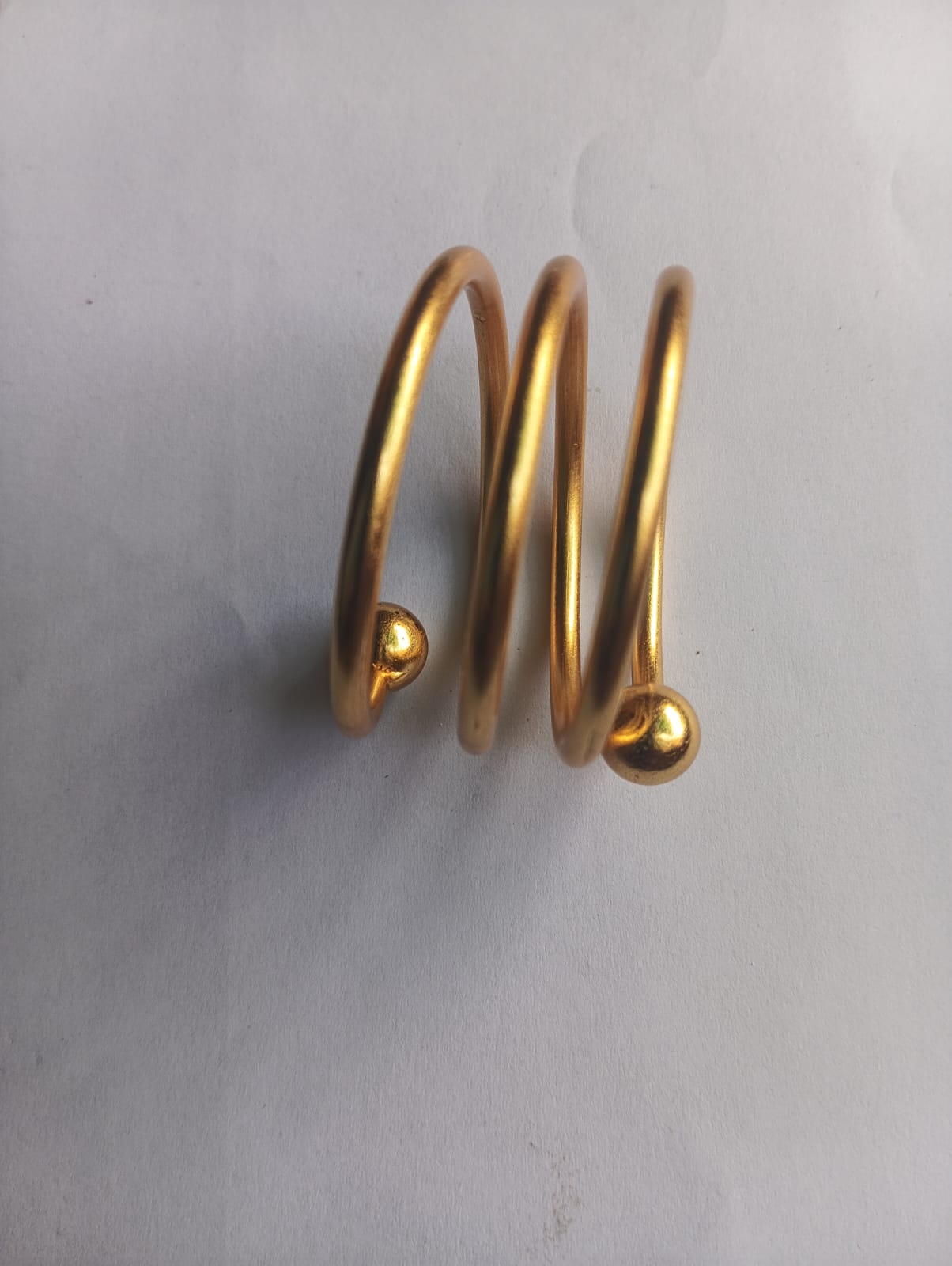 Gold finish spring napkin ring from Rose Broadleaf, elegant ring for table decor with a delicate spring design
