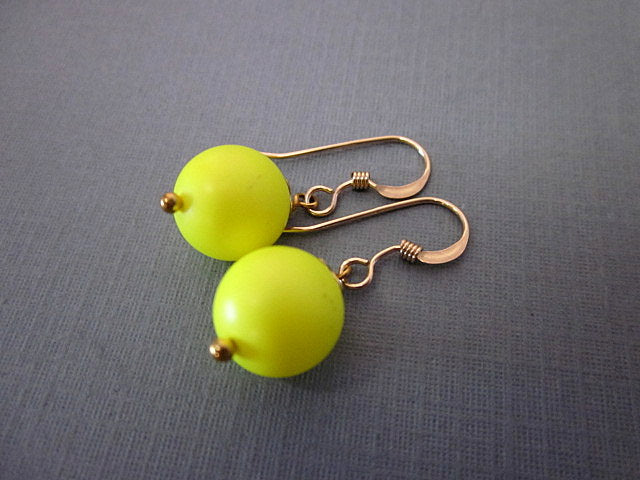 Mint Green Briseis neon bead dangle earrings with colorful glass beads and silver hooks, stylish and vibrant accessory for any outfit.