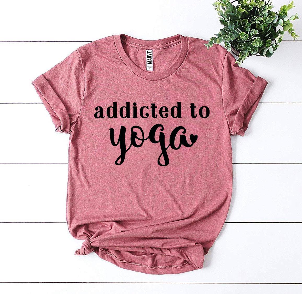 Agate Addicted To Yoga T-shirt showing a comfortable fit and stylish design on a white fabric background.