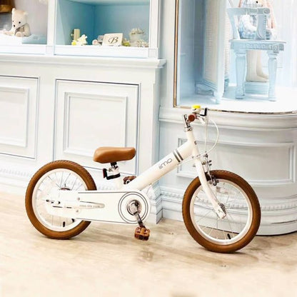 Purple Phaedra iimo 2-in-1 14-inch balance bike and pedal bike for kids, featuring a sleek purple frame and adjustable handlebars.