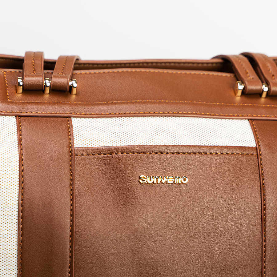 Maroon Chronos canvas tote diaper bag with sturdy handles and spacious interior for parenthood accessories.