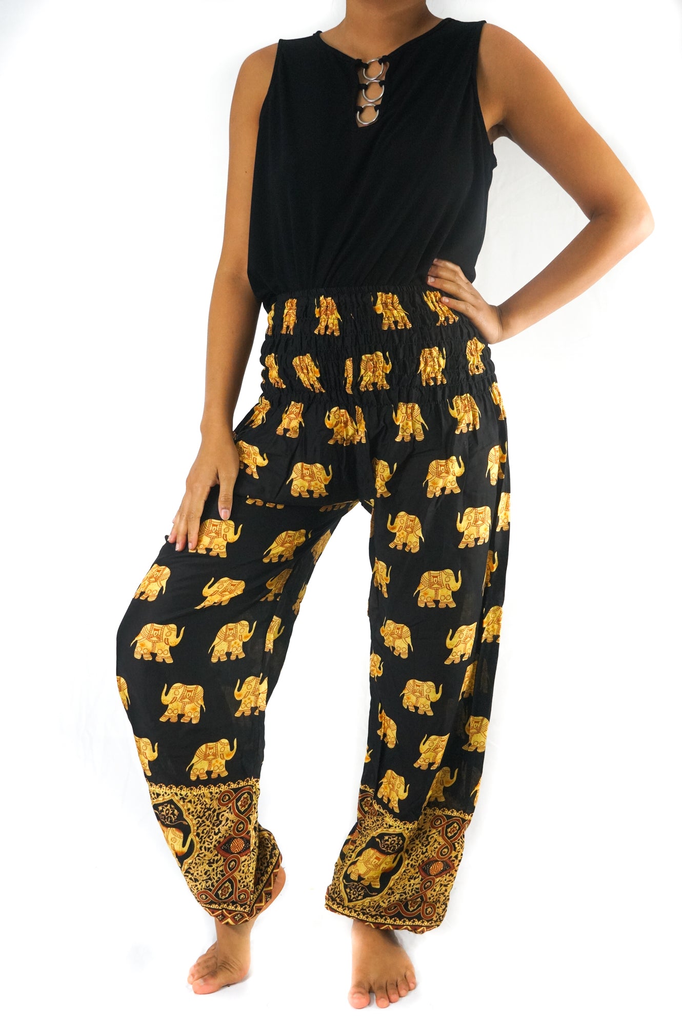 Black Elephant Pants for women, boho and hippie style yoga pants by Tan Smokey, featuring elephant print and relaxed fit.