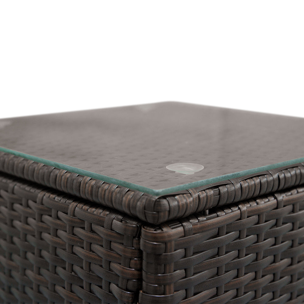 Lilac Milo home garden coffee table with rattan sofa set, featuring a stylish outdoor furniture arrangement on a patio.