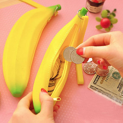 Fuchsia Molly banana design wallet with yellow and green accents, slim wallet style with zipper closure and compact size.