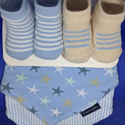 Baby sock and bib set from Ochre Ismene, featuring soft fabric, colorful patterns, and comfortable fit for infants and toddlers.