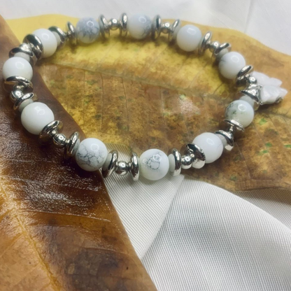 Jasper bead bracelet for women with silver spacer beads, stretch design, by Tan Saffron, featuring natural stone and metal accents.