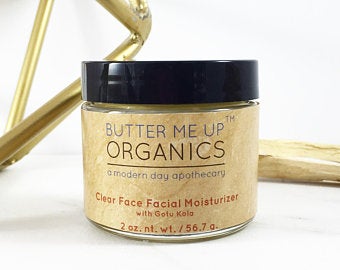 White Smokey organic face cream moisturizer in a white jar, showcasing a smooth, creamy facial skincare product.