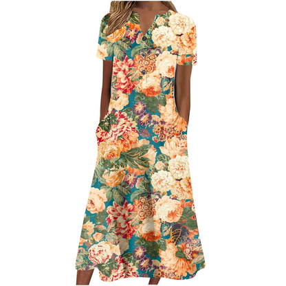 Women’s summer midi dress by Carmine Juneberry featuring a casual, lightweight design with pockets, perfect for warm weather.