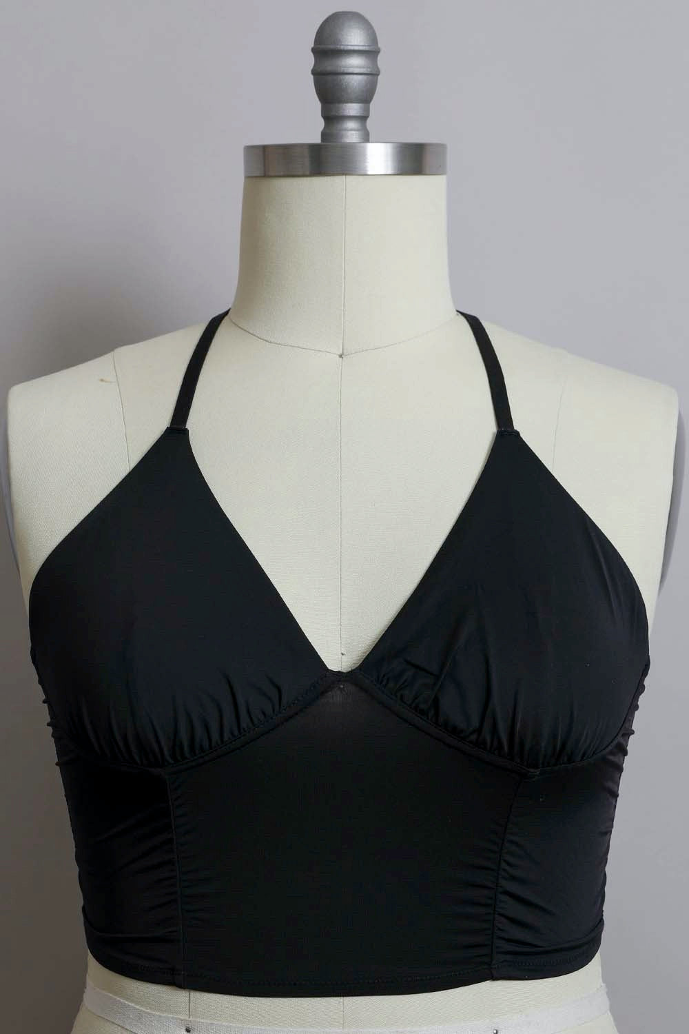 Plus size ruched bralette tank top by Periwinkle Aether with adjustable straps and comfortable fit, shown in a close-up view.