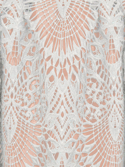 Salmon Bella Victoria skirt in soft fabric with a fitted waist and flowy hem, perfect for casual or dressy occasions.