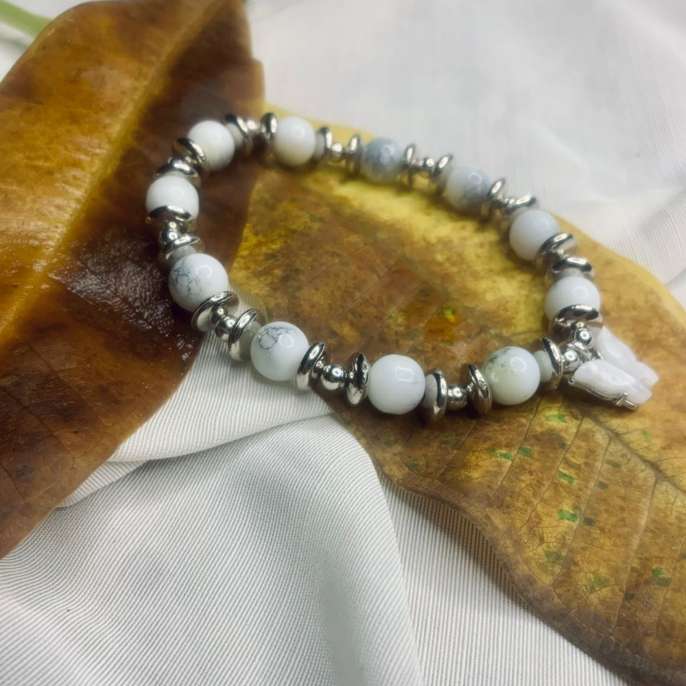 Jasper bead bracelet for women with silver spacer beads, stretchy Tan Saffron bracelet featuring natural stone and metallic accents.