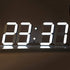Fuchsia Molly digital LED wall clock displaying time in a modern, sleek design for audio and video room decor.