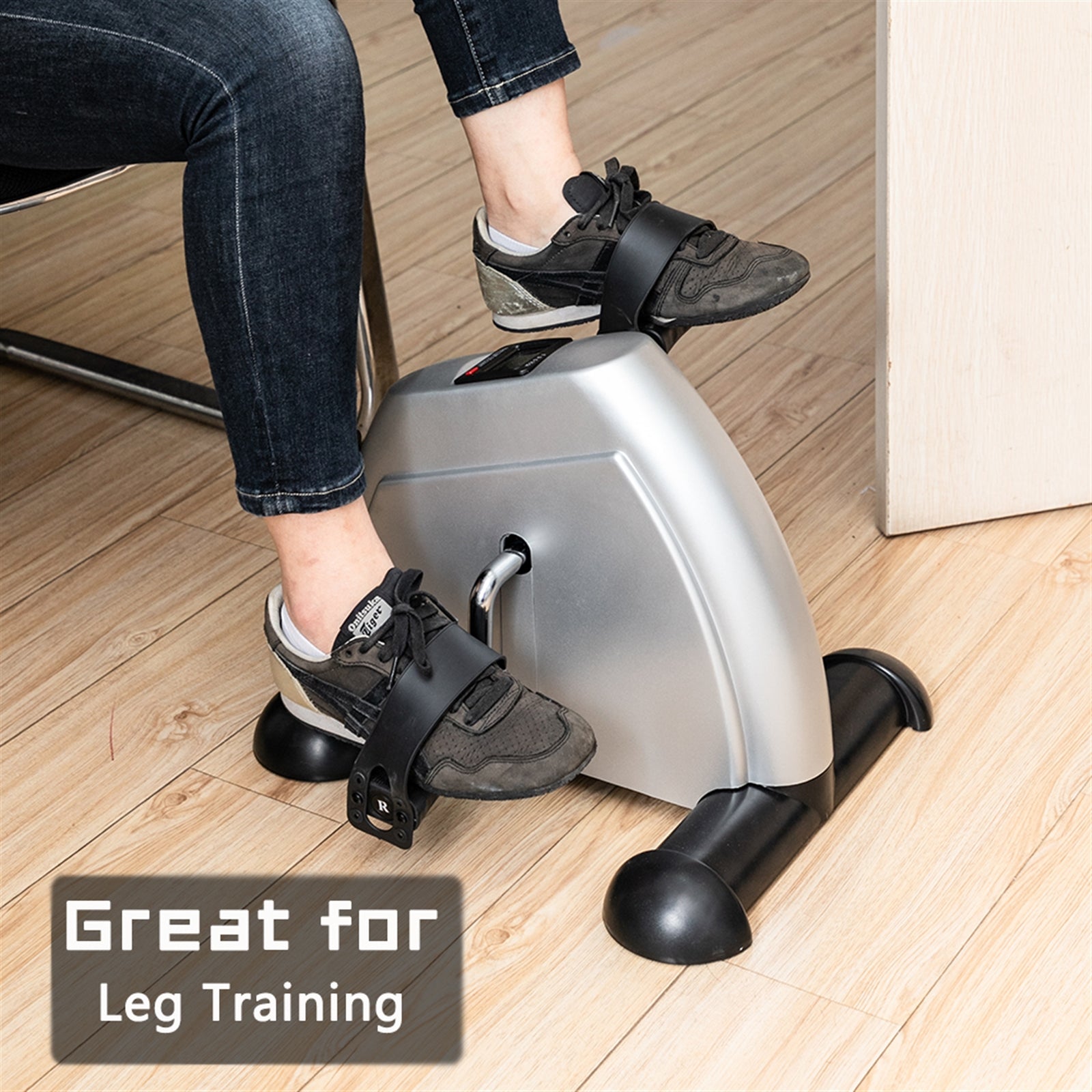 Lilac Milo home use hands and feet mini exercise bike with adjustable resistance for indoor exercise, shown on a clean surface.