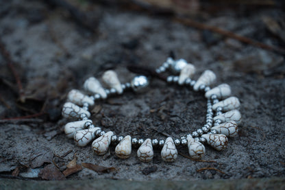 Silver boho double-stranded Ocean Drop bracelets by Tan Smokey featuring intricate ocean-inspired design details.