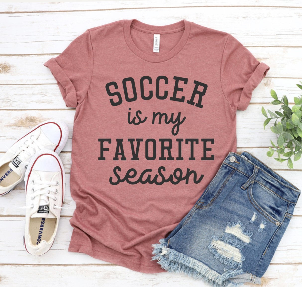 Agate soccer-themed T-shirt with "Soccer Is My Favorite Season" slogan, casual cotton shirt for soccer fans.