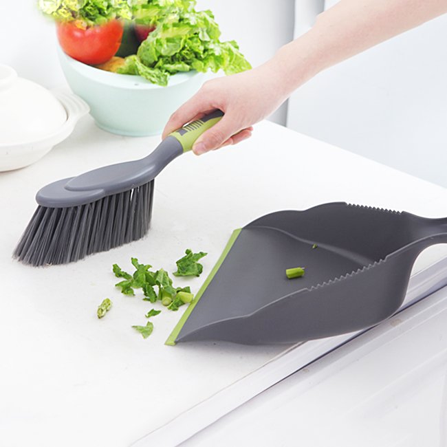 Fuchsia Molly desktop broom set for home and garden cleaning, including small brush and dustpan for easy tidying.