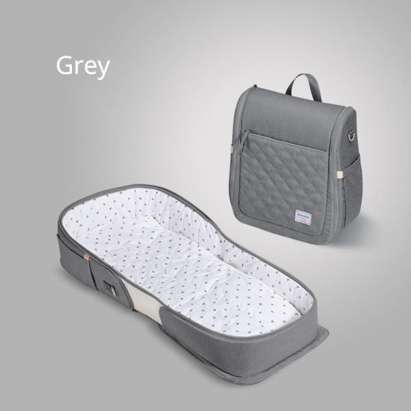Teal Simba baby portable foldable travel crib with carry bag, newborn nest bed, and compact design for kids and babies.