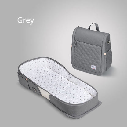 Teal Simba baby portable foldable travel crib with carry bag, newborn nest bed, and compact design for kids and babies.