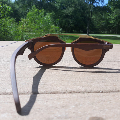 Purple Ariadne cherry wood full frame polarized sunglasses with gold trim, handcrafted eyewear with stylish, natural wood finish.