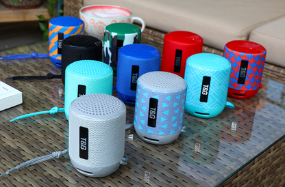 Lilac Milo Mini Gift Wireless Stereo Bluetooth Speaker showing compact design and control buttons on a white background.