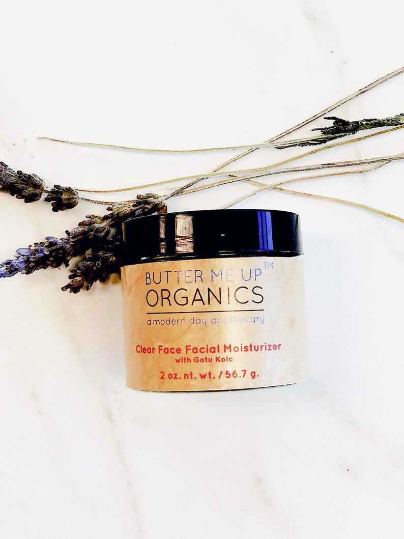 White Smokey organic face cream facial moisturizer in a white jar, showcasing smooth creamy texture for skincare hydration.