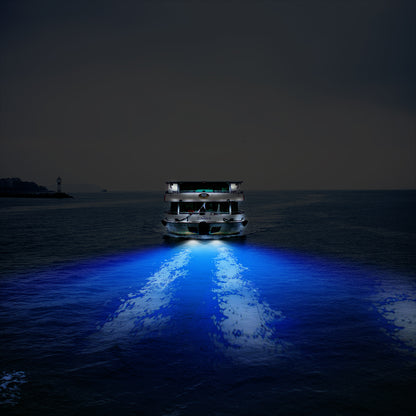 Stainless steel LED underwater pontoon ship light from Teal Simba, mounted on a boat with water reflections visible.