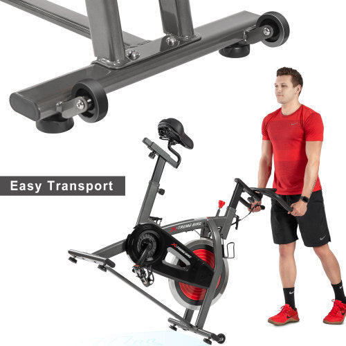 Teal Simba indoor cycling bike with 4-way adjustable handlebar and seat, LCD monitor for tracking workout data.