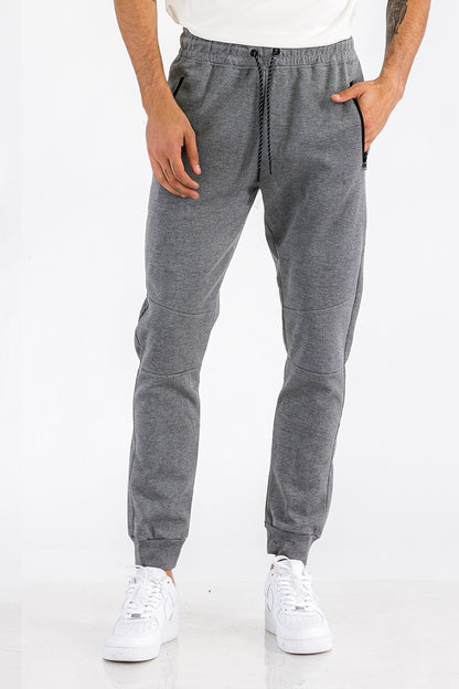 Light gray heathered cotton sweats for men from Lime Milo, showing a relaxed fit and soft fabric texture.