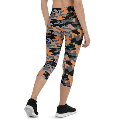 Orange and gray camo Capri leggings for women, Maroon Sooty activewear, featuring a bold camo pattern and comfortable fit.