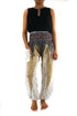 White peacock print boho pants by Tan Smokey, hippie-style yoga pants with a relaxed fit and flowing design.