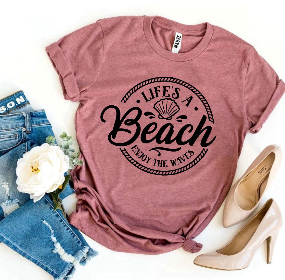 Agate Life’s a Beach Enjoy The Waves T-shirt featuring a beach and wave graphic, casual summer apparel for men and women.